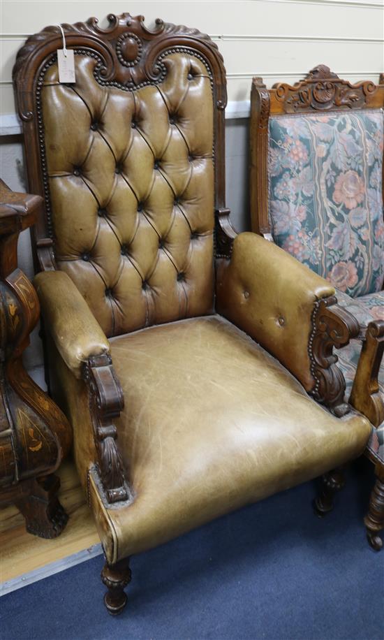 A pair of mid 19th century tan leather armchairs